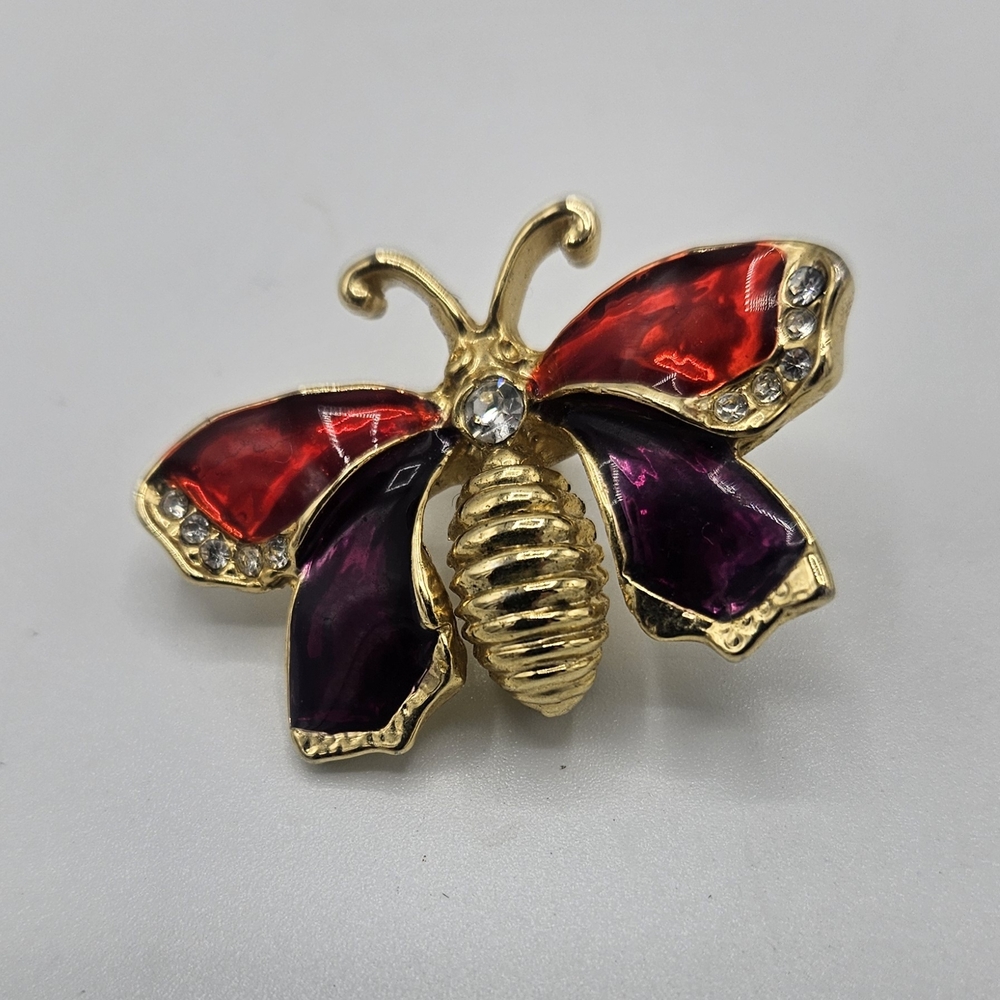 Elegant Gold Butterfly Brooch with Red and Purple Accents